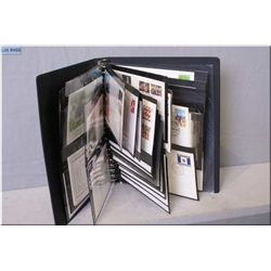 A binder of first day issue stamps including Coats of Arms, animals, horse racing, mining etc.