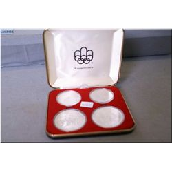 Set of four sterling silver 1976 Montreal Olympic coins including two $5 coins and two $10 coins