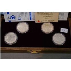 Boxed set of 1988 Calgary Winter Olympics sterling silver $20 coins, four coin set