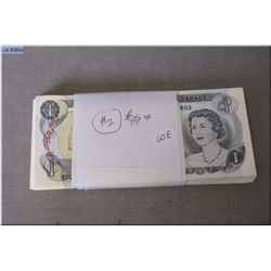 Eighty nine Canadian 1973 un-circulated one dollar bills with consecutive serial numbers starting at