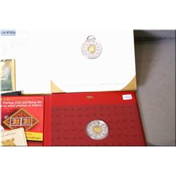 Two sterling coins 1998 Year of the Tiger and 2001 Year of the Snake in original packaging