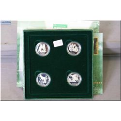 Boxed four piece presentation set "Little Wild Ones' in sterling silver issued in 1996
