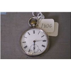 English .925 sterling silver size 14 C.K and Co., pinion set, open faced pocket watch in working ord