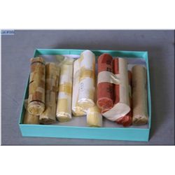 Twelve rolls of Canadian pennies labelled in the 1950's and 60's, unverified