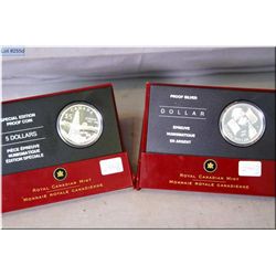 Two cased Canadian sterling coins including a 2005 dollar and five dollar coins