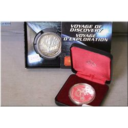 2000 Voyage of Discovery sterling Canadian dollar and a cased 1983 Edmonton Universiade dollar