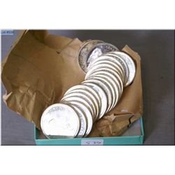 Twenty Canadian 1965 silver dollars in un-circulated condition