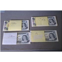 Approximately seventy un-circulated 1973 one dollar bills in four groups of consecutive serial numbe