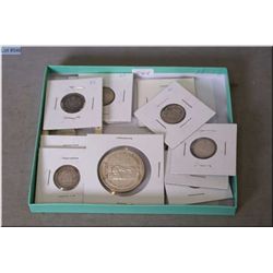 Selection of Canadian coins including 1958 silver dollar, 1948 quarters, 10 cent pieces including 19