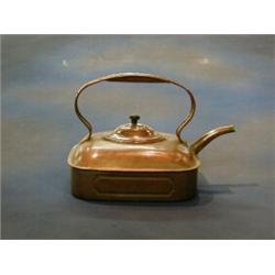 A 19th Century copper tea kettle   £30-40...