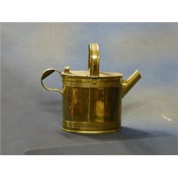 A Victorian brass hotwater carrier   £20-30...