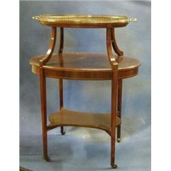 An Edwardian inlaid mahogany oval 2 tier etagere, the top with removable tray and raised on squar...