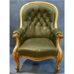 A Victorian bleached mahogany show frame tub back armchair upholstered brown buttoned rexine and...