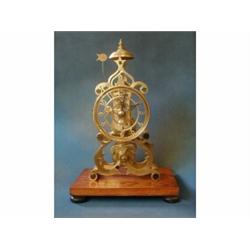 A fusee skeleton clock, the 6" pierced brass dial with Arabic numerals, the reverse marked E D St...