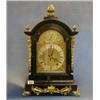 An Edwardian striking bracket clock the 6" arched brass dial with Roman numerals and silvered cha...