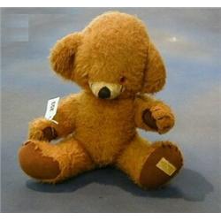 A Merrythought teddybear, the head fitted a bell £20-30...