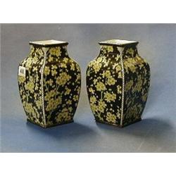 A pair of Royal Doulton square pottery vases with floral decoration, the bases marked Royal Doult...