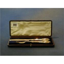 A Victorian silver christening set comprising knife and fork Sheffield 1853, cased £30-50...