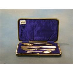 An Edwardian silver Old English pattern 4 piece christening set comprising knife, fork, spoon and...