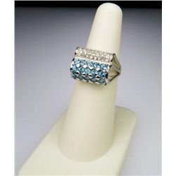 Pretty Ribbon Style Blue Topaz and Diamond Ring.