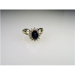 Finely Appointed Oval Blue Sapphire and Diamond