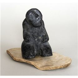 Inuit Carving of an Inuk by Marc Alikashua - Eskimo Point 6" H. 8" L.  Good Condition