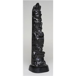 Argillite Totem by Captain Andy Brown Carved with an Eagle, Human Holding Two Fish, Raven with Coppe