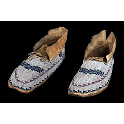 Pair of Arapaho Fully Beaded Moccasins ca. 1890, Sinew Sewn, Soft Supple Hide with Remains of Ochre 
