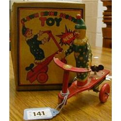 Boxed tin plate, and mechanical clown (Lehmann type) £50-100