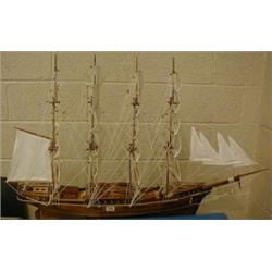 Wooden model ship with hollow hull on stand £90-110