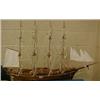 Image 1 : Wooden model ship with hollow hull on stand £90-110