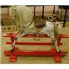 Image 1 : Pitch pine rocking horse on red rockers (needs some restoration) £200-300