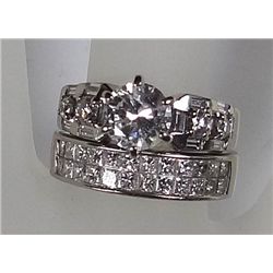 FABULOUS DIAMOND RING. CENTER DIAMOND IS A 1.05 CT, I-2, I COLOR