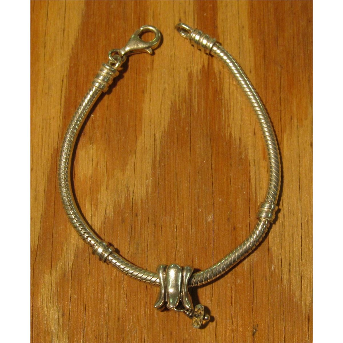 2. 6” Pandora bracelet, modified with a lobster clasp, comes with one