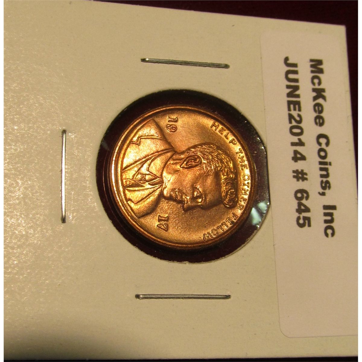 645. 1917 “Help The Other Fellow” token featuring Henry Ford, uniface ...