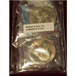 712. (2) BU Eisenhower Dollars from Mint Sets, still in mint cello – 1973 & 1973-D – great way to ge