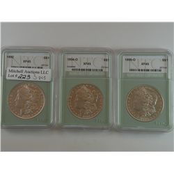 A trio of NTC XF45 better date Morgan Dollars