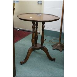 Vintage walnut triple column, center pedestal occasional table with carved highlight