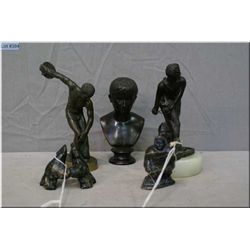 Selection of collectibles including cast bronze figures and two small carved soap stones