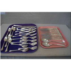 A selection of sterling silver Reed and Barton flatware including nine dinner knives, nine dinner fo