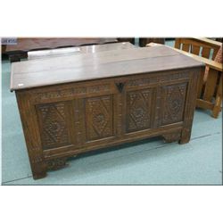 Antique oak hope chest with carved panels and original hardware