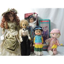 LOT 6 ASSORTED DOLLS.