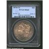 Image 1 : 1878-CC S$1 MS65 PCGS. A lustrous and well struck Gem whose eye appeal is immense due to the lovely.