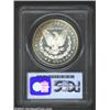 Image 2 : 1884-CC S$1 MS65 Deep Mirror Prooflike PCGS. Warm orange-gold iridescence is seen around the periphe