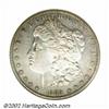 Image 1 : 1889-CC S$1 AU50 ANACS. Direct light angles reveal considerable mint luster still in evidence on bot