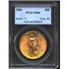 Image 1 : 1926 $20 MS64 PCGS. The otherwise orange-gold color lightens to warm golden-rose hues in the centers
