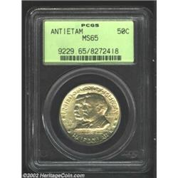 1937 50C Antietam MS65 PCGS. This is a fully lustrous Gem with richly frosted surfaces and swirling.