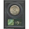 Image 2 : 1938 50C Arkansas MS65 PCGS. The otherwise tan-gray toning scheme yields to vivid orange-gold irides