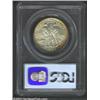 Image 2 : 1935 50C Boone MS66 PCGS. Rich orange-red iridescence hugs the rims in a mottled fashion. The balanc