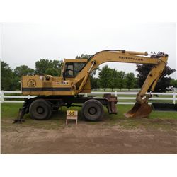 Caterpillar 212 rubber tire excavator SN-5DC00229